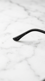 عینک آفتابی مردانه پرسول (Persol) مدل D24 | فریم فلزی دو پل مشکی با عدسی پلاریزه و UV400